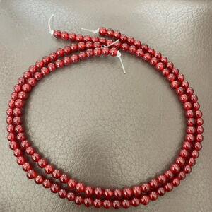 Two Strands Unstrung Possibly Carnelian Beads